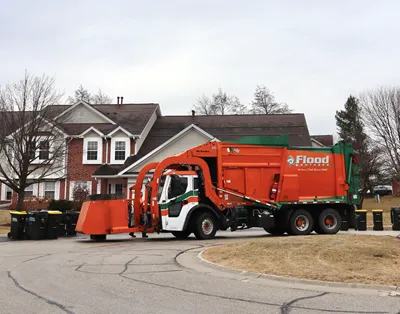 Residential recycling truck in neighborhood